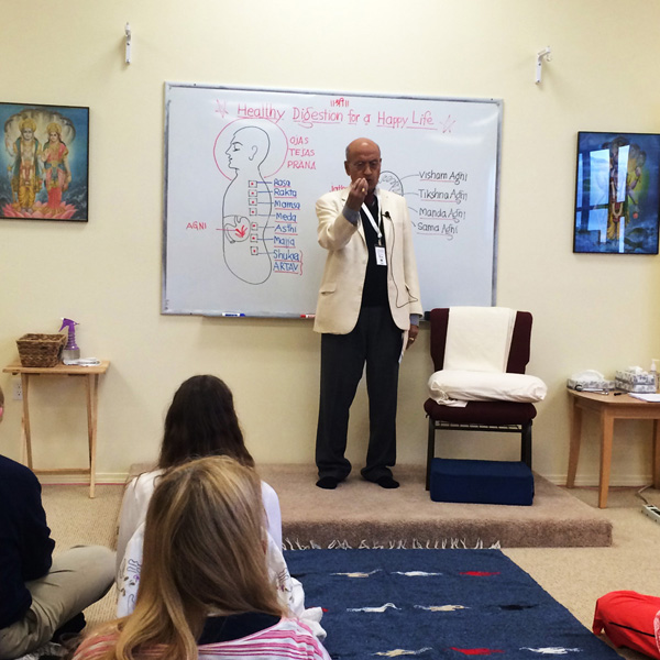 Dr Vasant Lad giving a lecture